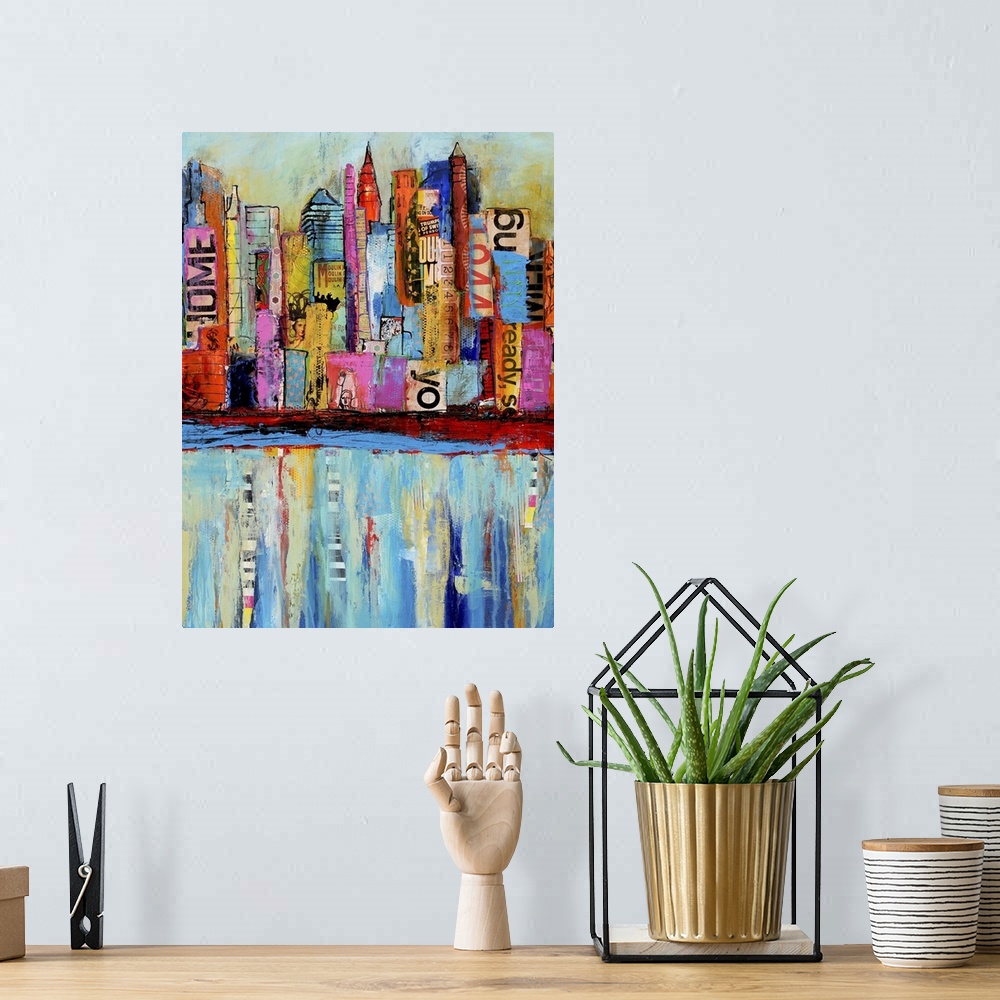 A bohemian room featuring Contemporary art piece that uses different colors and patches to create a city skyline which soft...