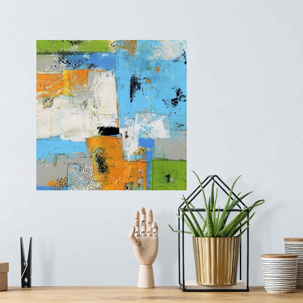 A bohemian room featuring A square contemporary abstract painting with heavy textures and a variety of shapes and lines tha...