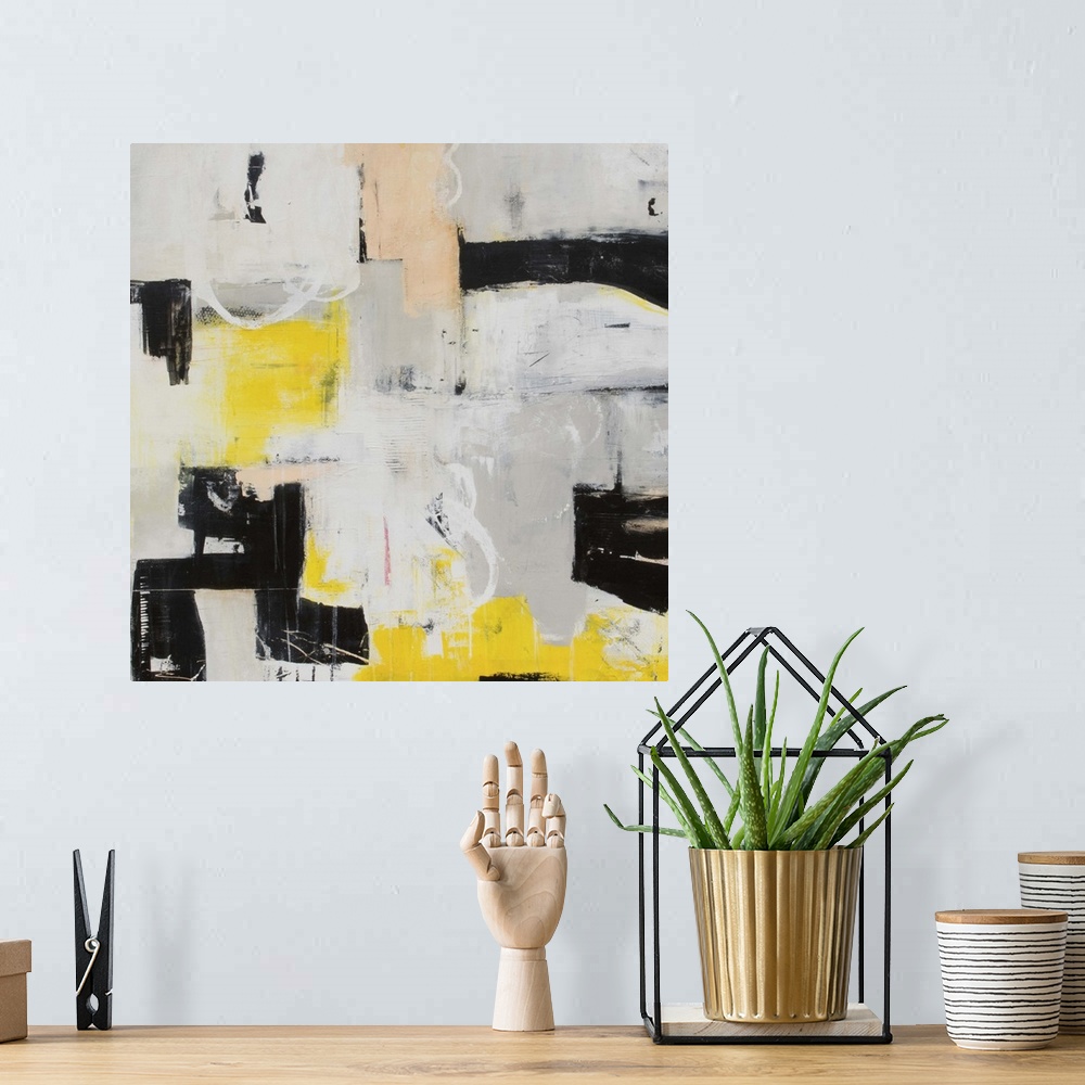 A bohemian room featuring Contemporary abstract art in grey and black with pops of yellow.