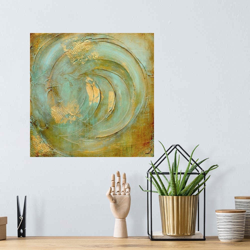 A bohemian room featuring This heavily textured contemporary artwork features an abstract circular design with inspirationa...