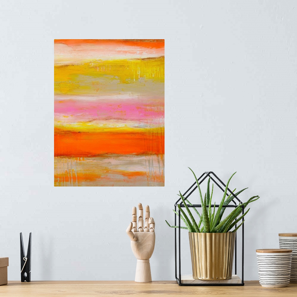 A bohemian room featuring Tall abstract painting of various bright colors layered horizontally with textured brush strokes.