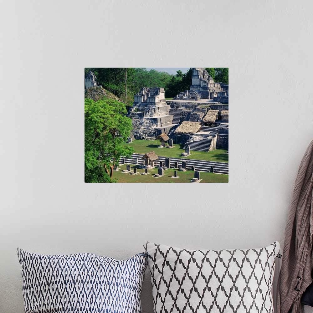A bohemian room featuring Central America, Guatemala, Tikal, Great Plaza, mayan ruins