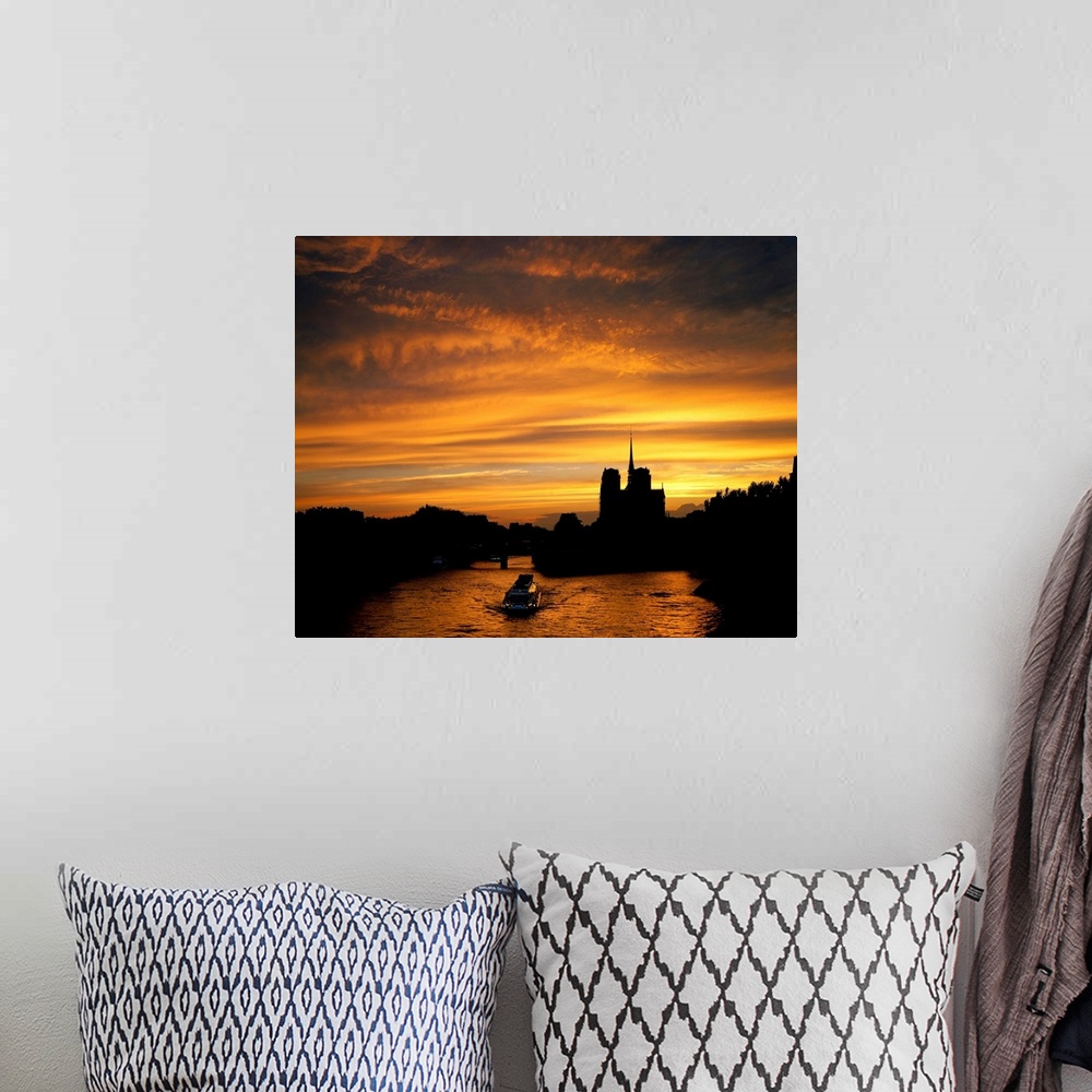 A bohemian room featuring France, Paris, view of the Seine and Norte Dame at sunset