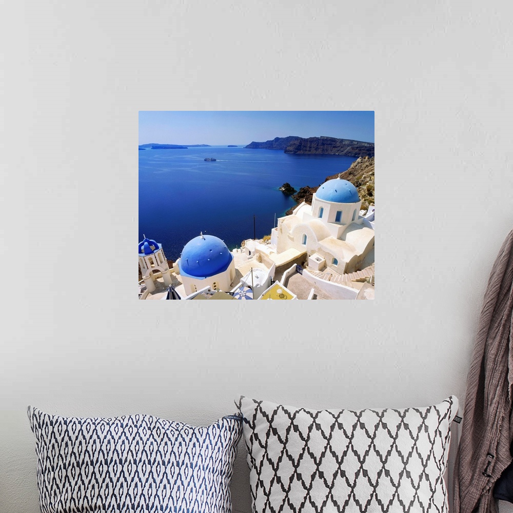 A bohemian room featuring Greece, Cyclades, Santorini, Oia, view towards the sea