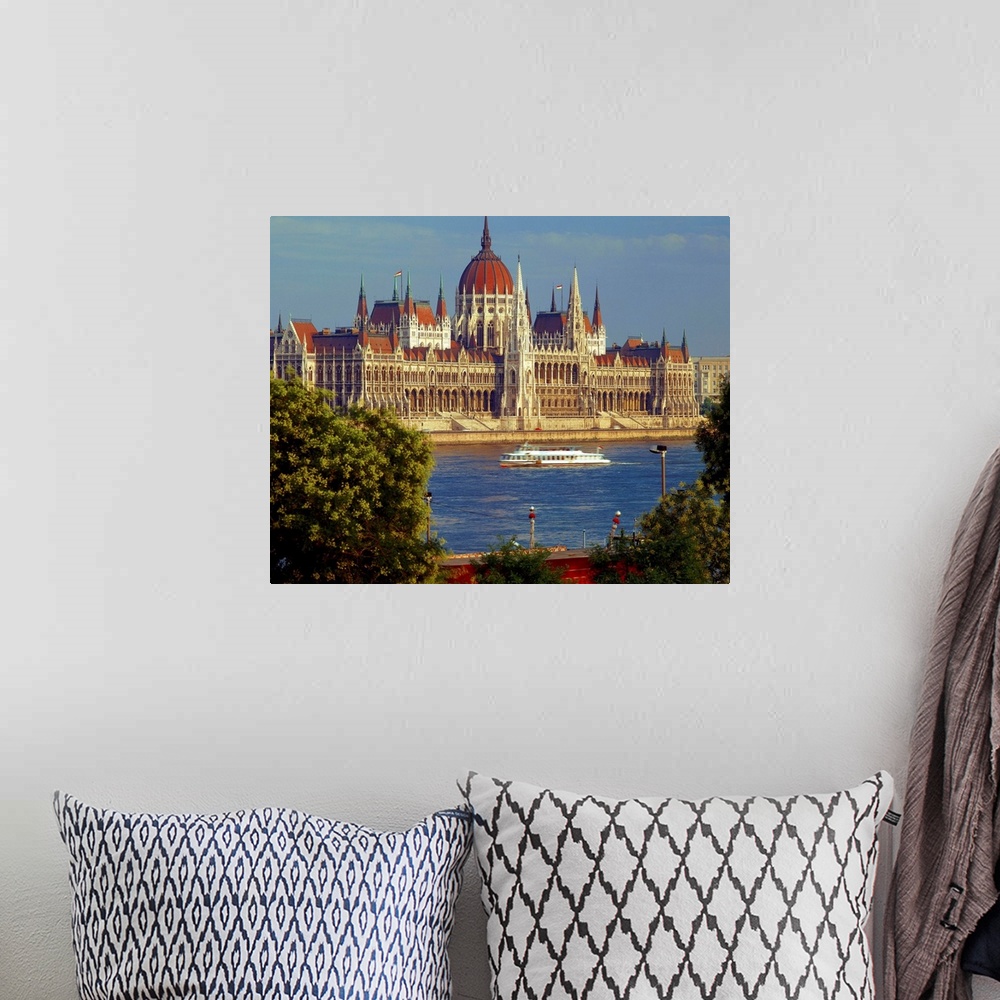 A bohemian room featuring Hungary, Budapest, View of the Parliament on Danube river