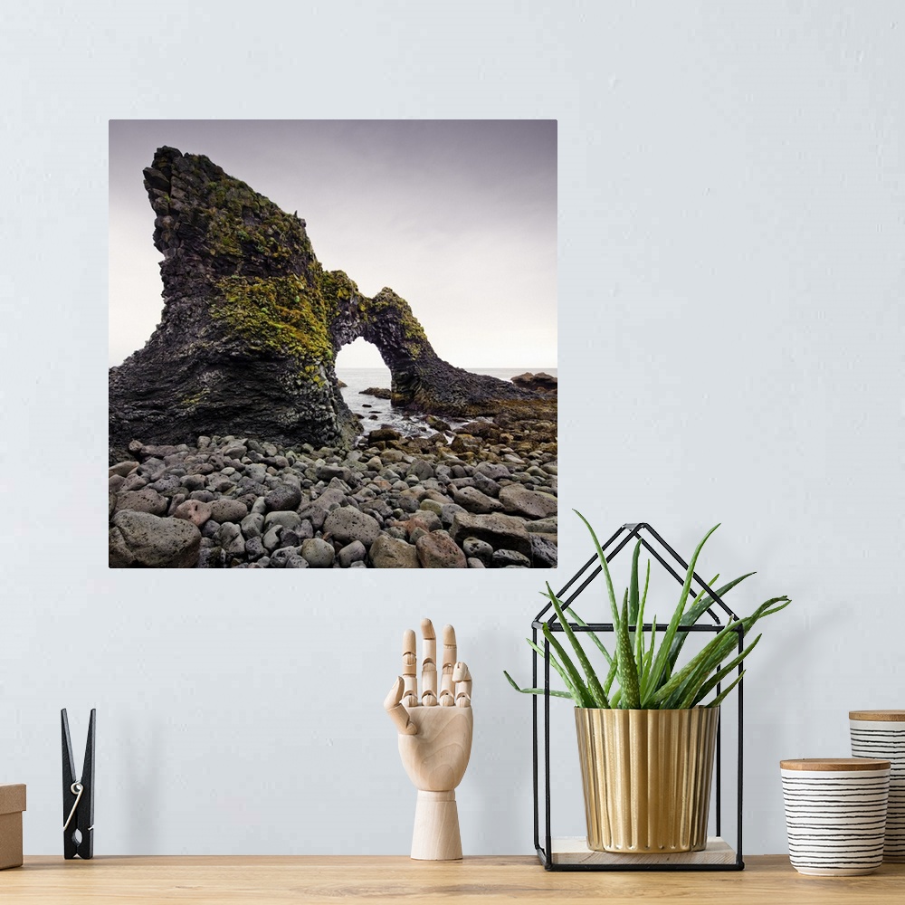 A bohemian room featuring Iceland, West Iceland, Snaefellsnes, Natural Rock arch at Arnastapi.