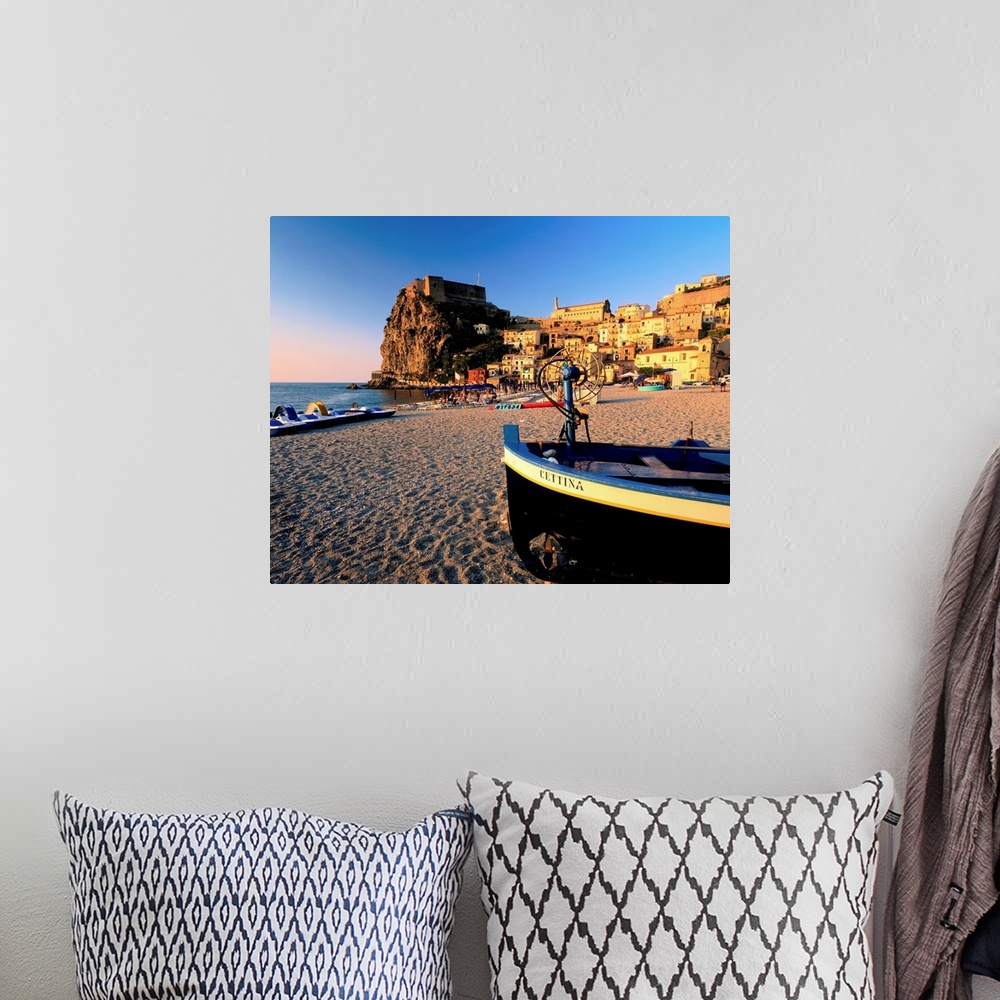 A bohemian room featuring Italy, Calabria, Scilla, view on town and beach