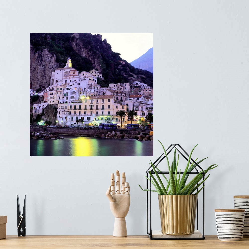 A bohemian room featuring Italy, Campania, Amalfi Coast view of town at dusk
