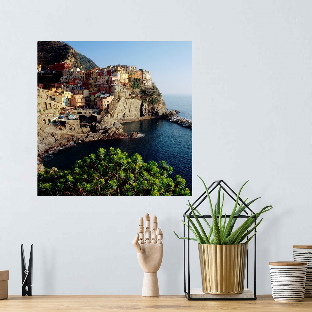 A bohemian room featuring Italy, Liguria, Cinque Terre, Manarola, view towards the village