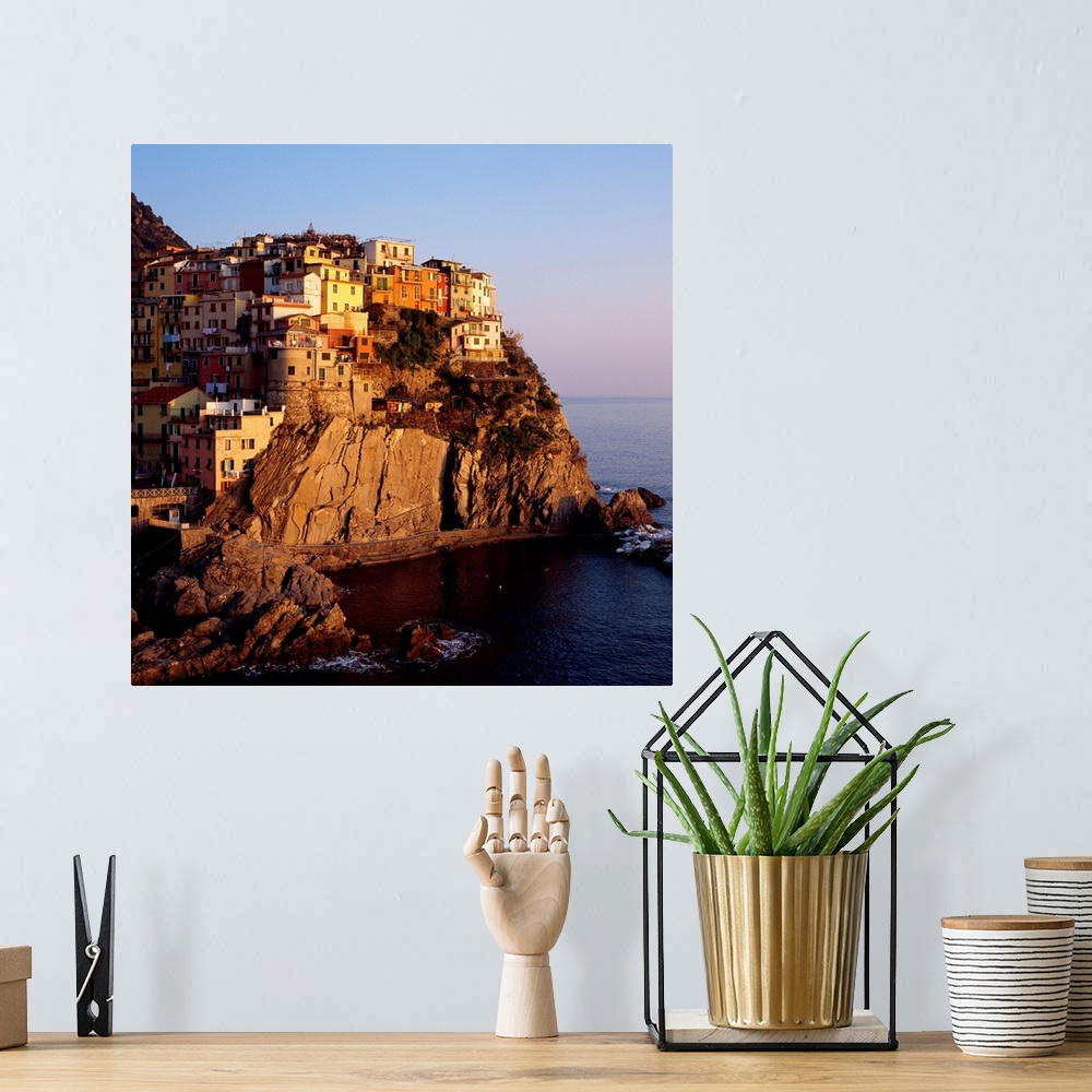 A bohemian room featuring Italy, Liguria, Cinque Terre, Manarola, view towards the village