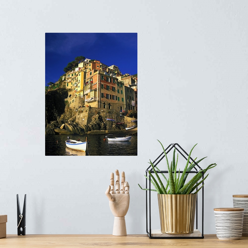 A bohemian room featuring Italy, Liguria, Riomaggiore, port