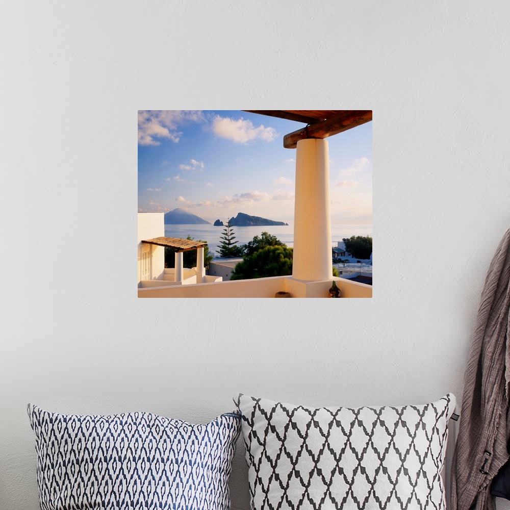 A bohemian room featuring Italy, Sicily, Panarea island, view to Basiluzzo islet and Stromboli island