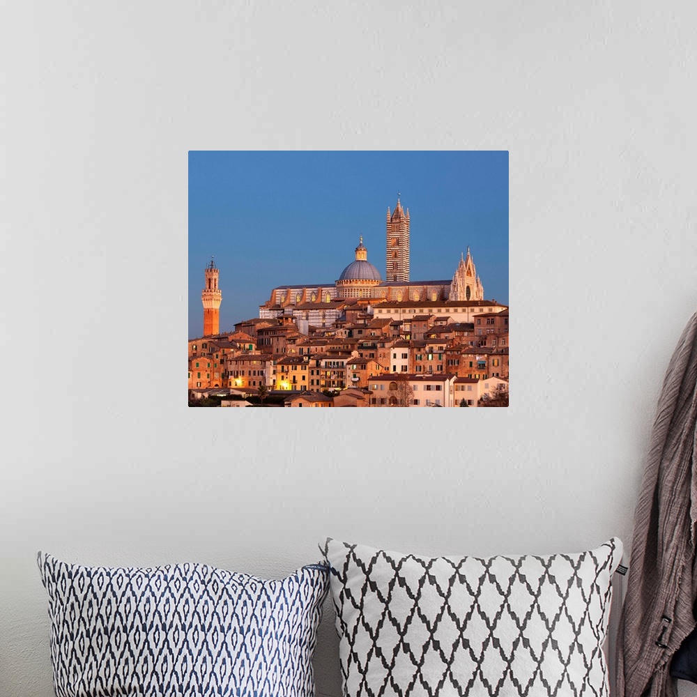 A bohemian room featuring Italy, Tuscany, Siena district, Siena, City at sunset with the cathedral in the background and To...