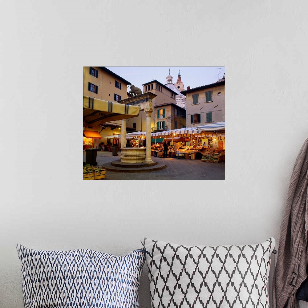A bohemian room featuring Italy, Tuscany, Pistoia, Piazza del Mercato and Well of the Lion Cub