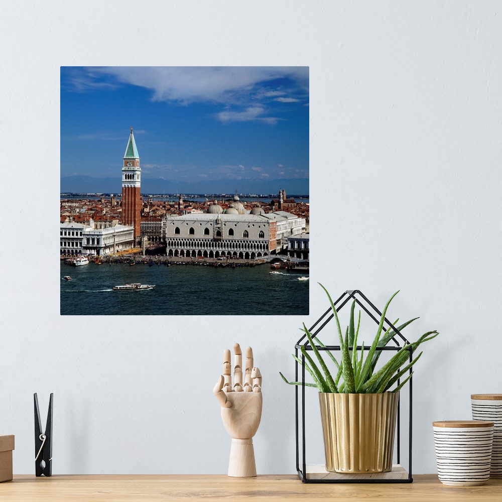 A bohemian room featuring Italy, Venice, Piazzetta, bell tower of Basilica di San Marco, Alps in background