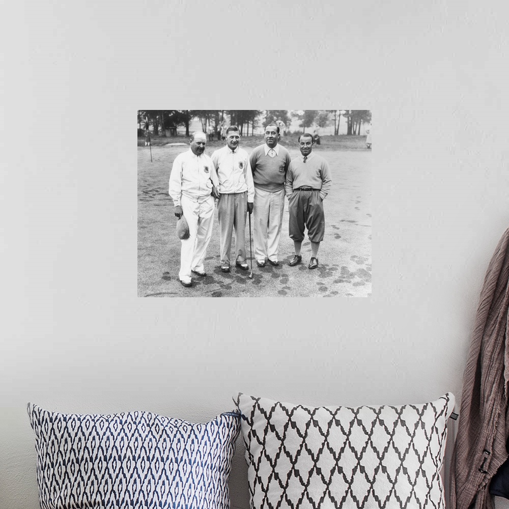A bohemian room featuring 1935 Ryder Cup Scotch foursome. L-R: Alf Perry and John Busson of the British team; and Walter Ha...