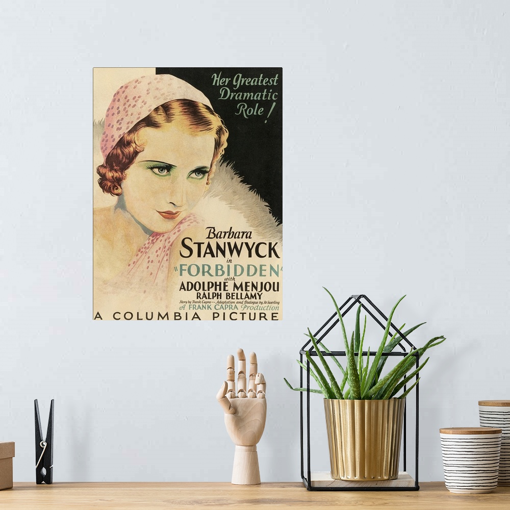 A bohemian room featuring Forbidden - Vintage Movie Poster