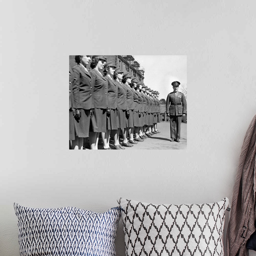 A bohemian room featuring Drill Instructor with uniformed recruits at Marine Corps Women's Reserve Officer's Candidate Scho...