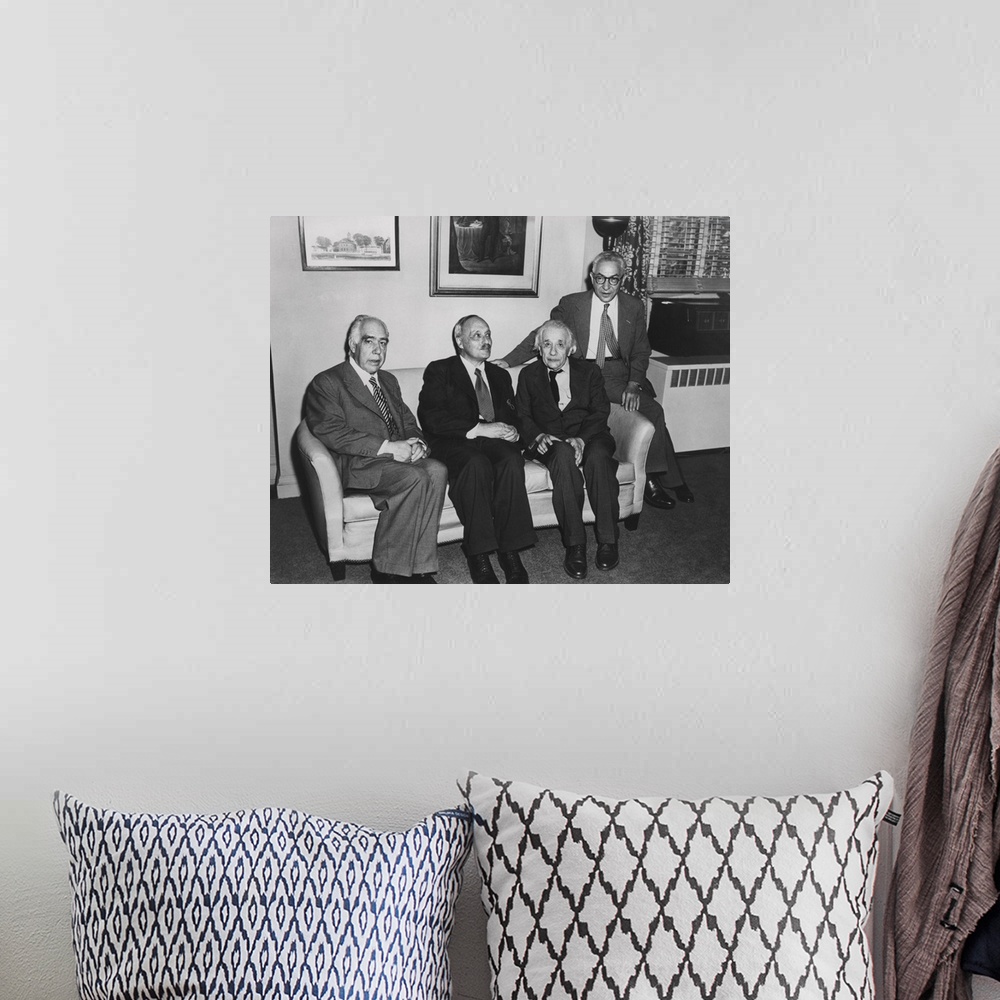 A bohemian room featuring Portrait of four famous nuclear physicists. L-R: Niels Bohr; James Franck; Albert Einstein; and I...