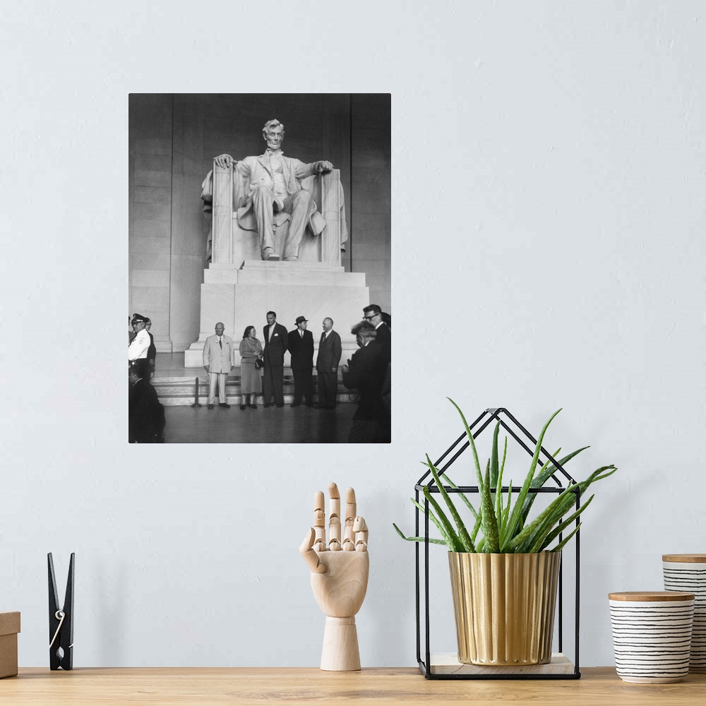 A bohemian room featuring Premier Nikita Khrushchev and others beneath the Lincoln statue in the Lincoln Memorial. L-R: Nik...