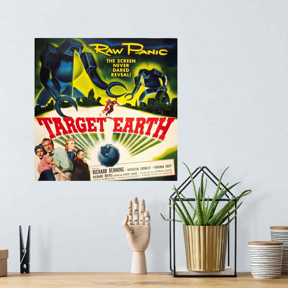 A bohemian room featuring Target Earth - Vintage Movie Poster
