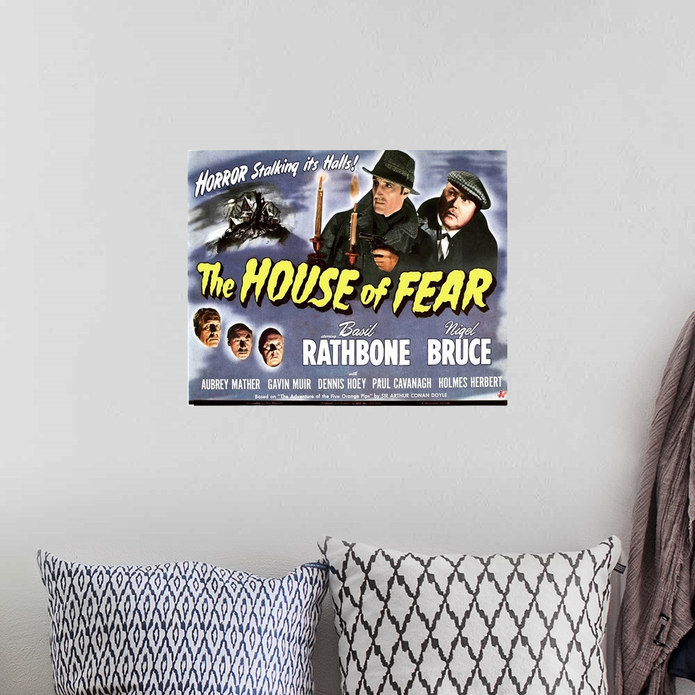 A bohemian room featuring The House of Fear - Vintage Movie Poster