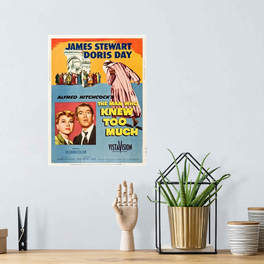 A bohemian room featuring The Man Who Knew Too Much - Vintage Movie Poster
