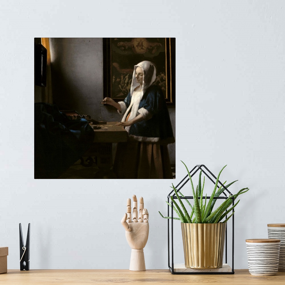 A bohemian room featuring Woman Holding a Balance, by Johannes Vermeer, c. 1664, Dutch painting, oil on canvas. A painting ...