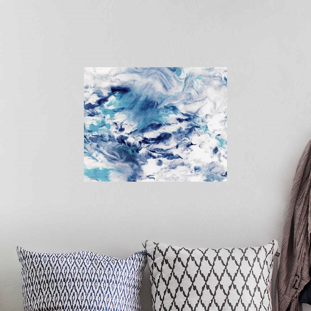 A bohemian room featuring Contemporary abstract painting in wavy blue and white, resembling ocean water.