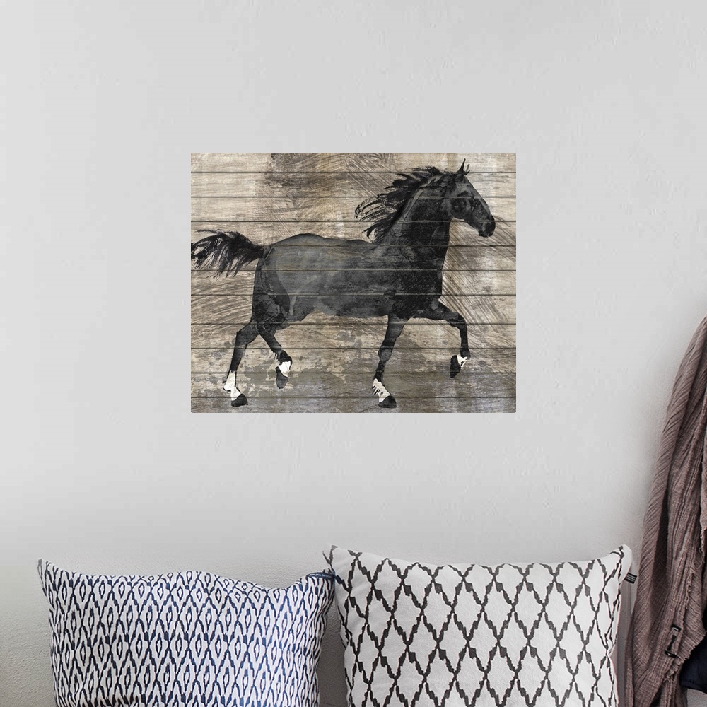 A bohemian room featuring A decorative image of a black horse on a rustic wood backdrop.