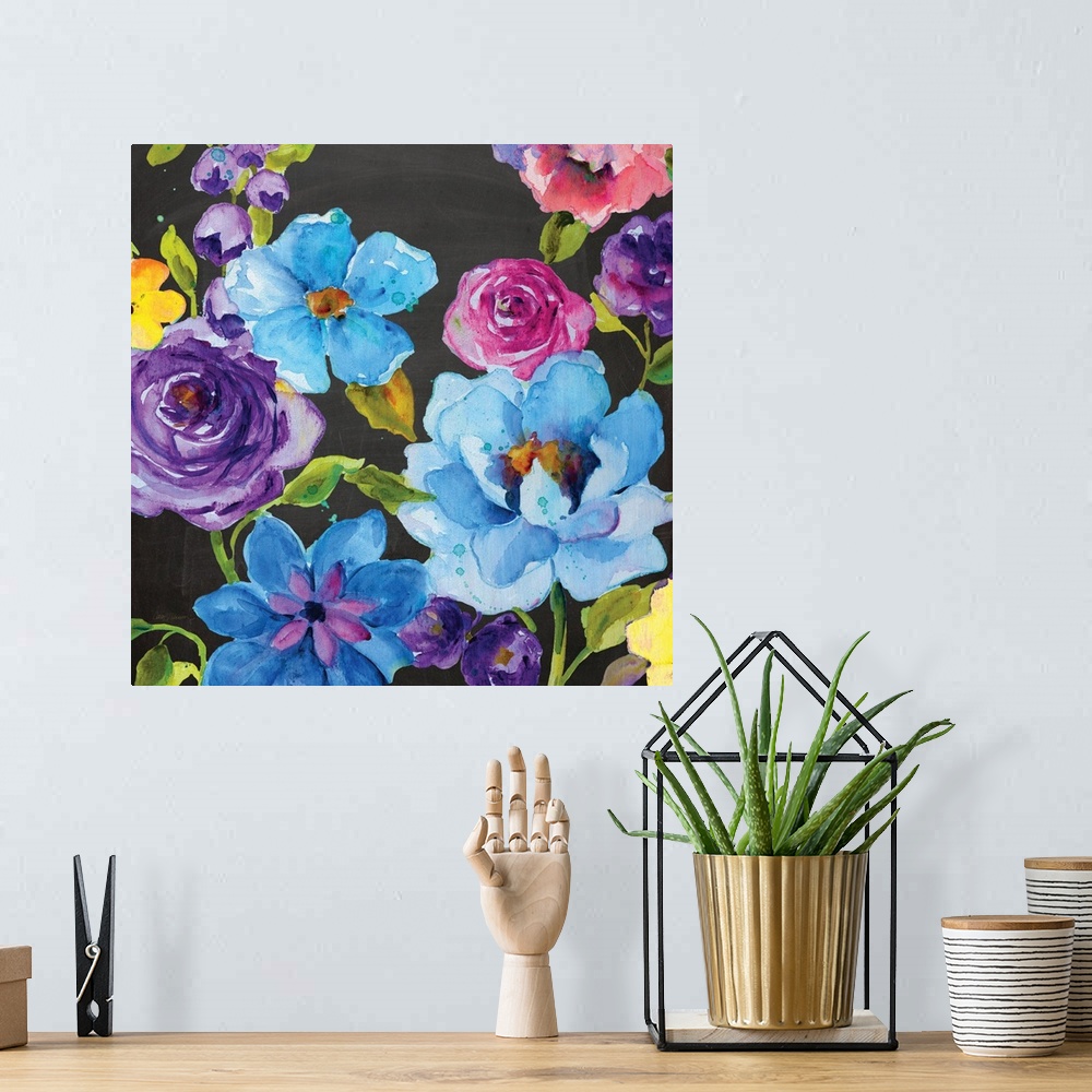 A bohemian room featuring An assortment of watercolor flowers rest on a chalkboard background.