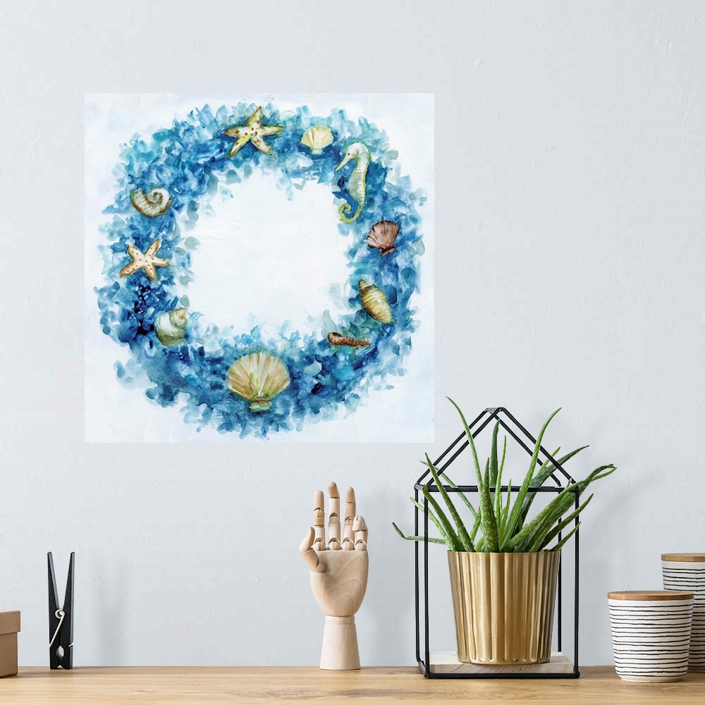 A bohemian room featuring Artwork of a blue Christmas wreath decorated with ocean shells.