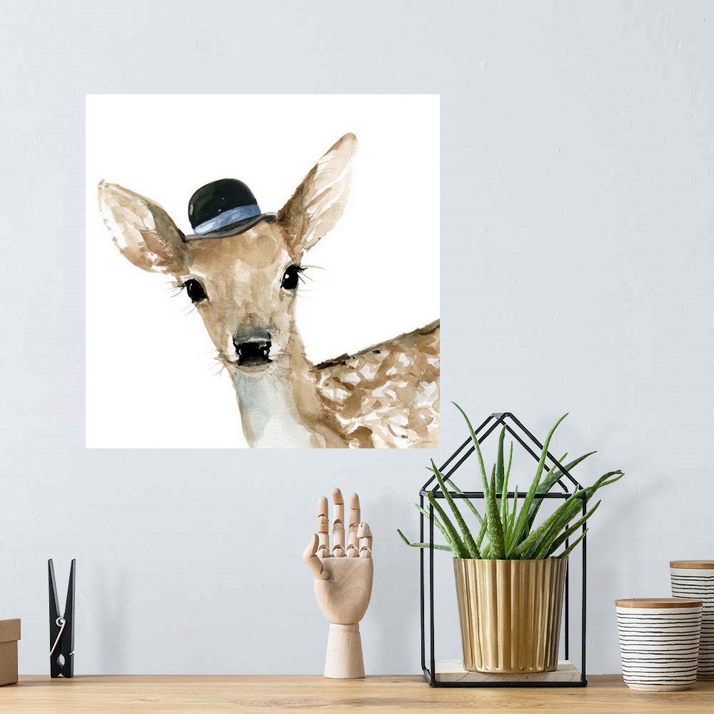 A bohemian room featuring Watercolor painting of a doe wearing a small black hat with a blue stripe on a white square backg...