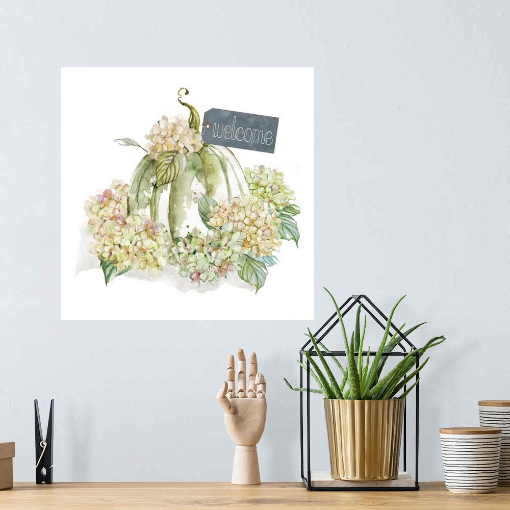A bohemian room featuring Square harvest decor with watercolor hydrangeas and a pumpkin with a tag on it that reads "Welcome"