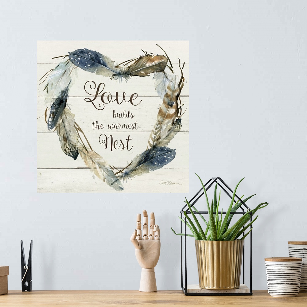 A bohemian room featuring Square watercolor painting with a heart shaped wreath made of feathers and the phrase "Love Build...