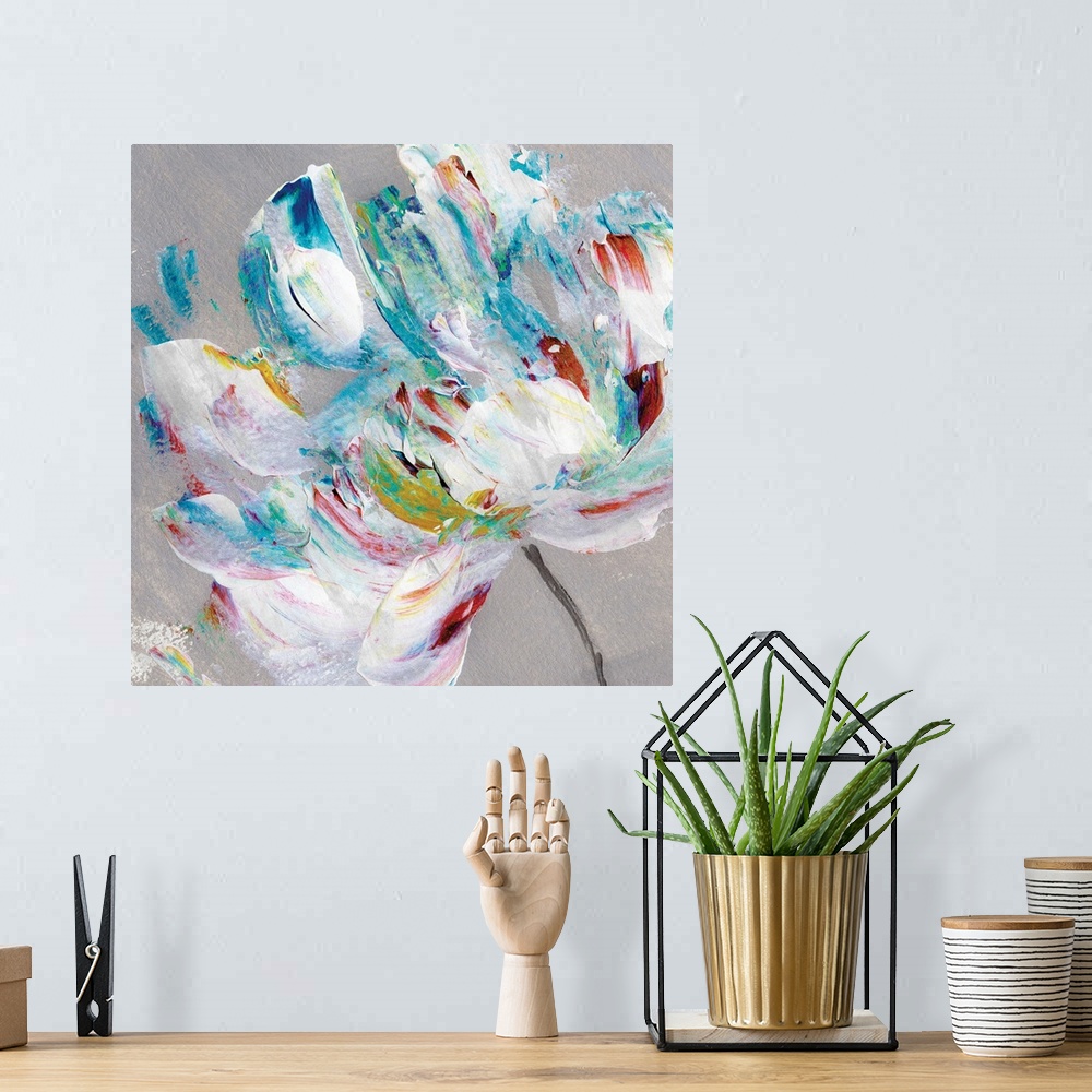 A bohemian room featuring Square abstract painting of a colorful flower on a grey background.