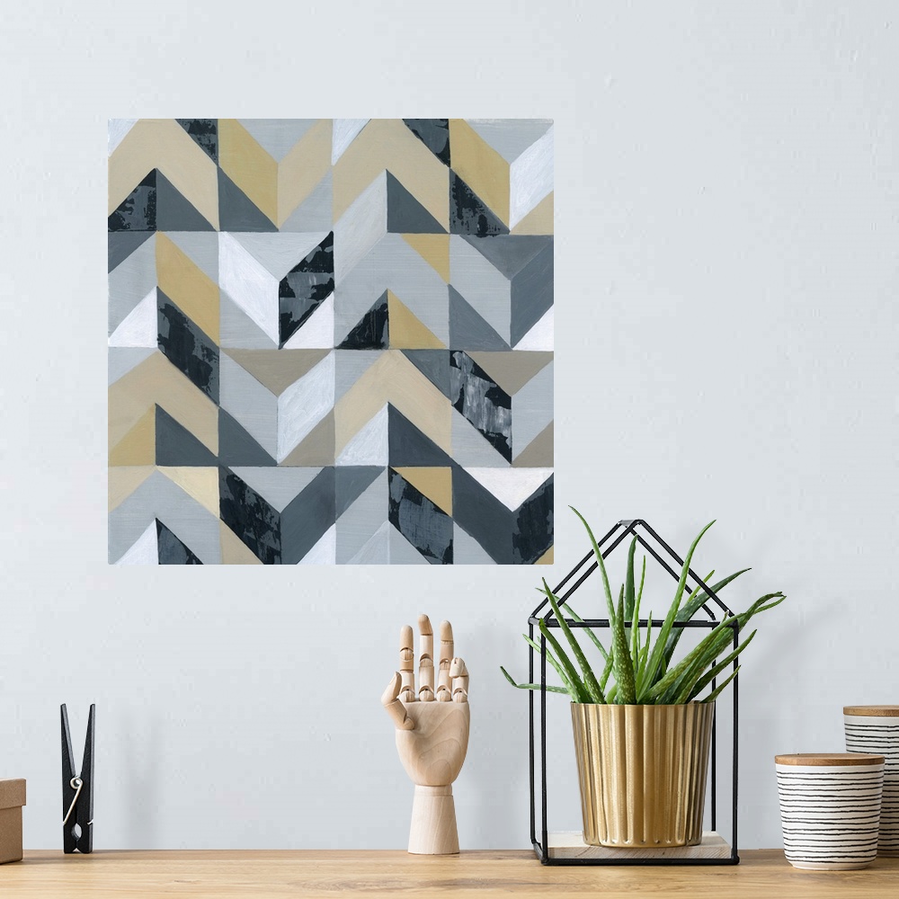 A bohemian room featuring Geometric abstract art with shapes coming together to make a zig-zag pattern in shades of gray, b...
