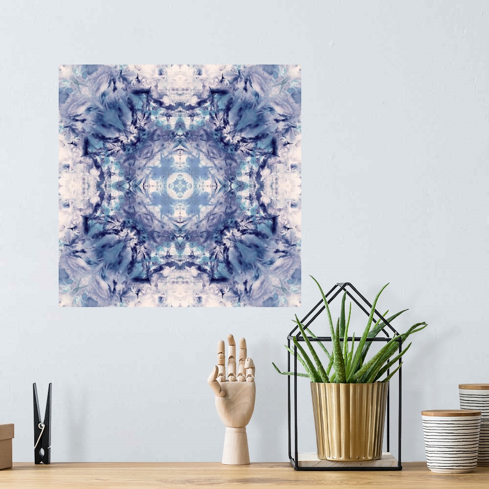 A bohemian room featuring Square abstract art in shades of blue and white hues with kaleidoscope-like patterns and designs.