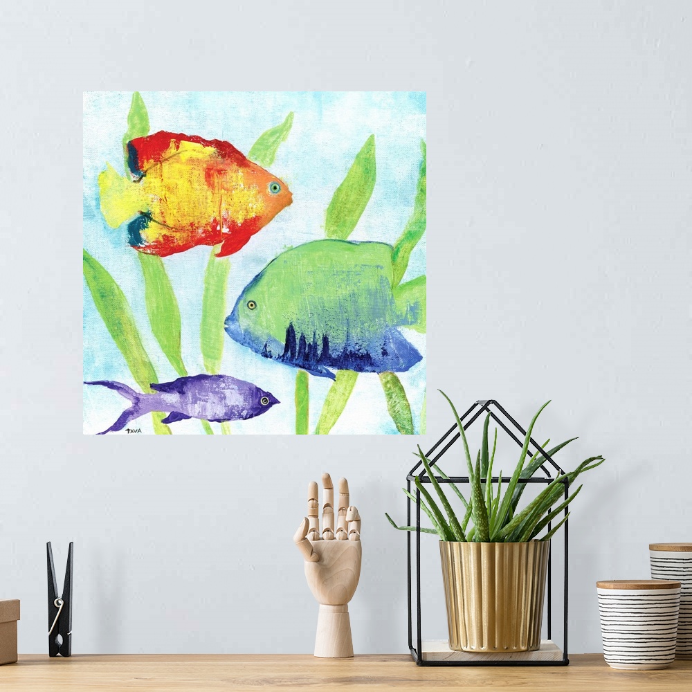 A bohemian room featuring A painting of brightly colored fishes that are swimming near seaweed.
