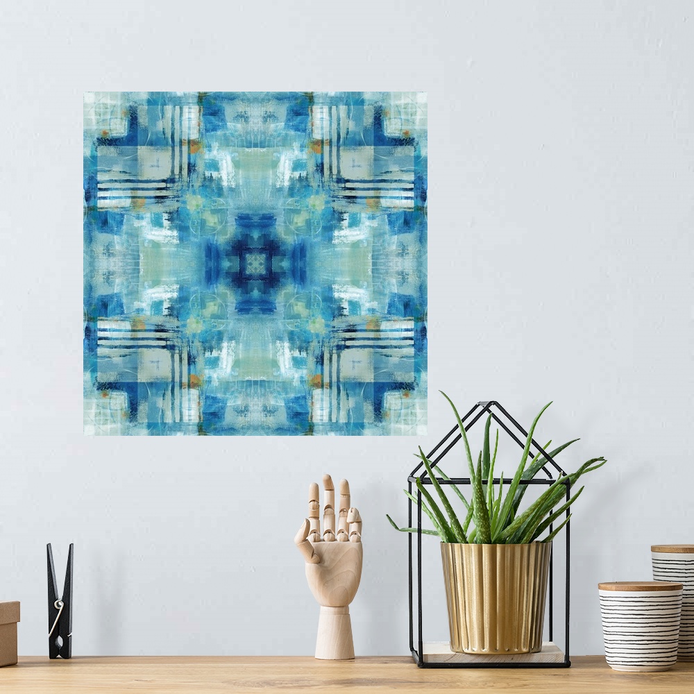 A bohemian room featuring Large square painting made with shades of blue, green, white, and gold and patterns resembling a ...
