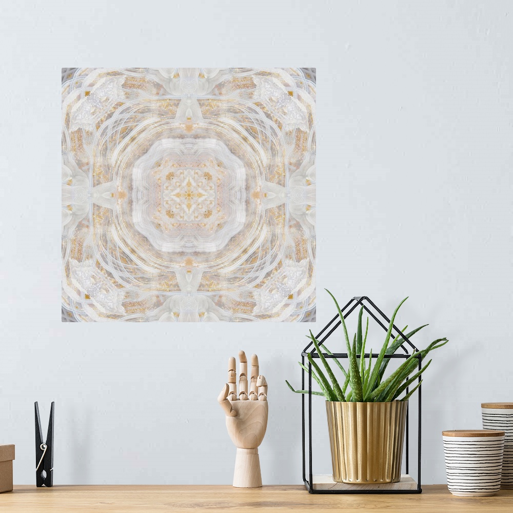 A bohemian room featuring Silver, cream, and gold abstract decor resembling a view through a kaleidoscope.
