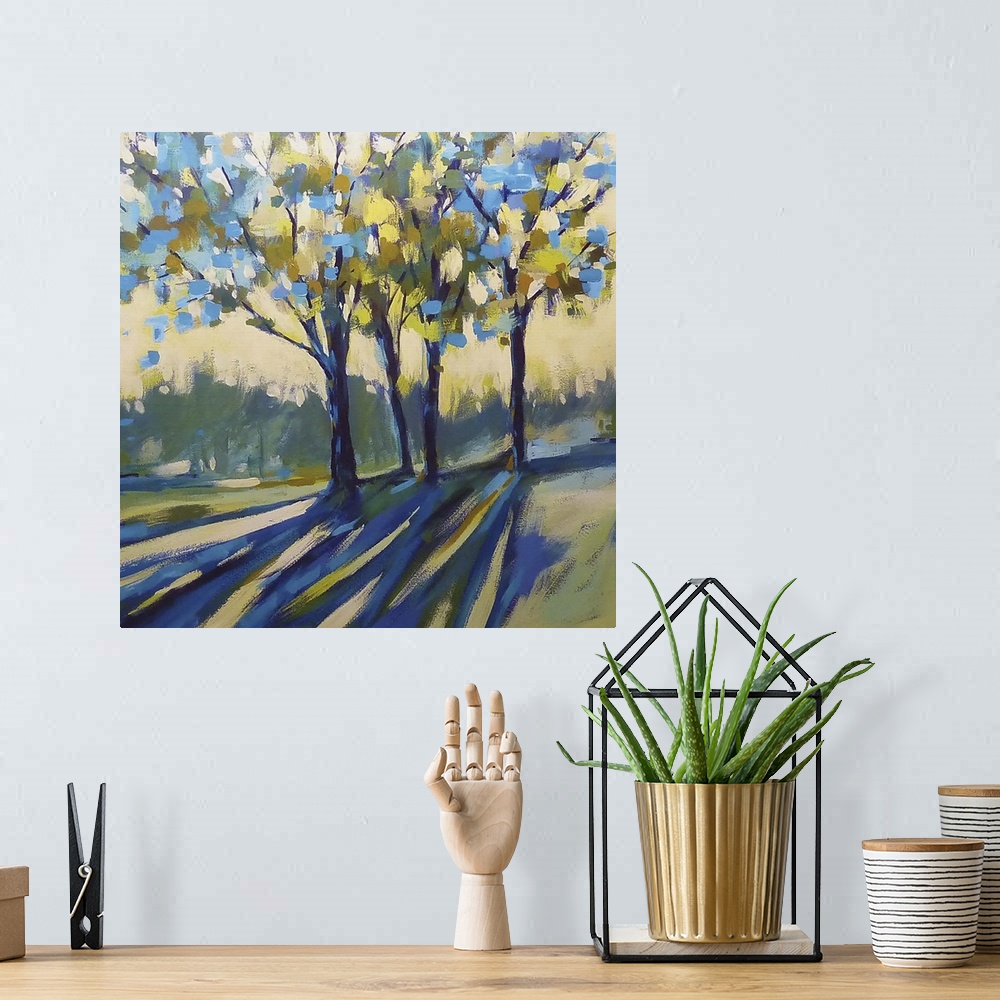 A bohemian room featuring Contemporary home decor artwork of a a grove of trees bathed in sunlight and casting shadows in t...