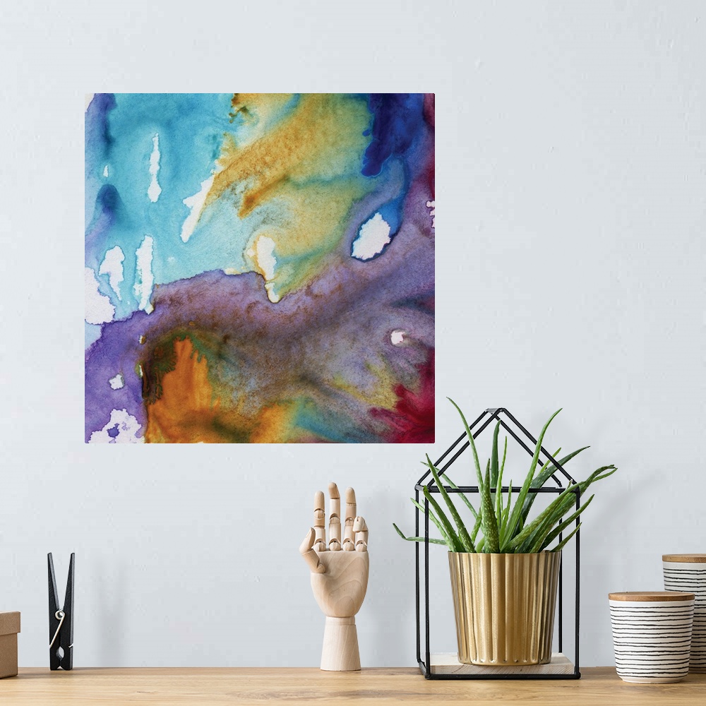 A bohemian room featuring Abstract watercolor painting of blending shades of blue and purple.