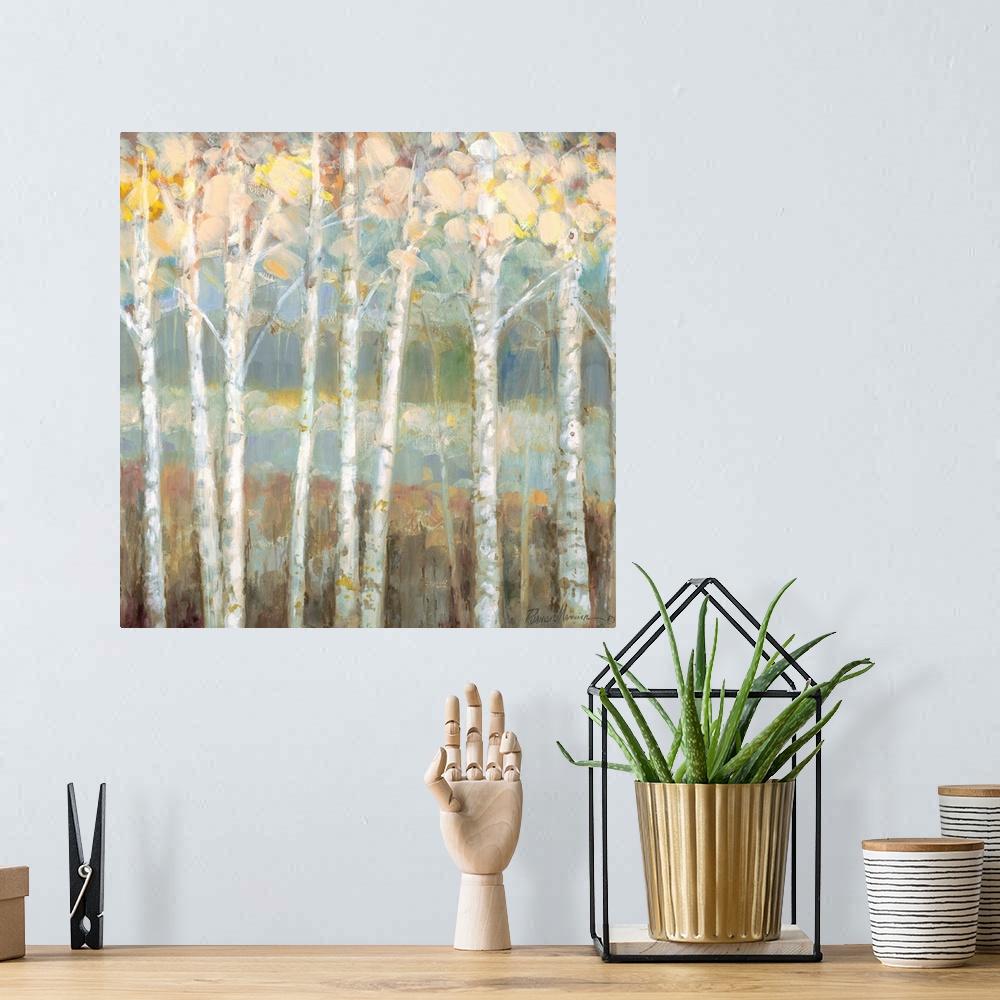 A bohemian room featuring Square painting of an abstract  tree covered landscape with light hues.