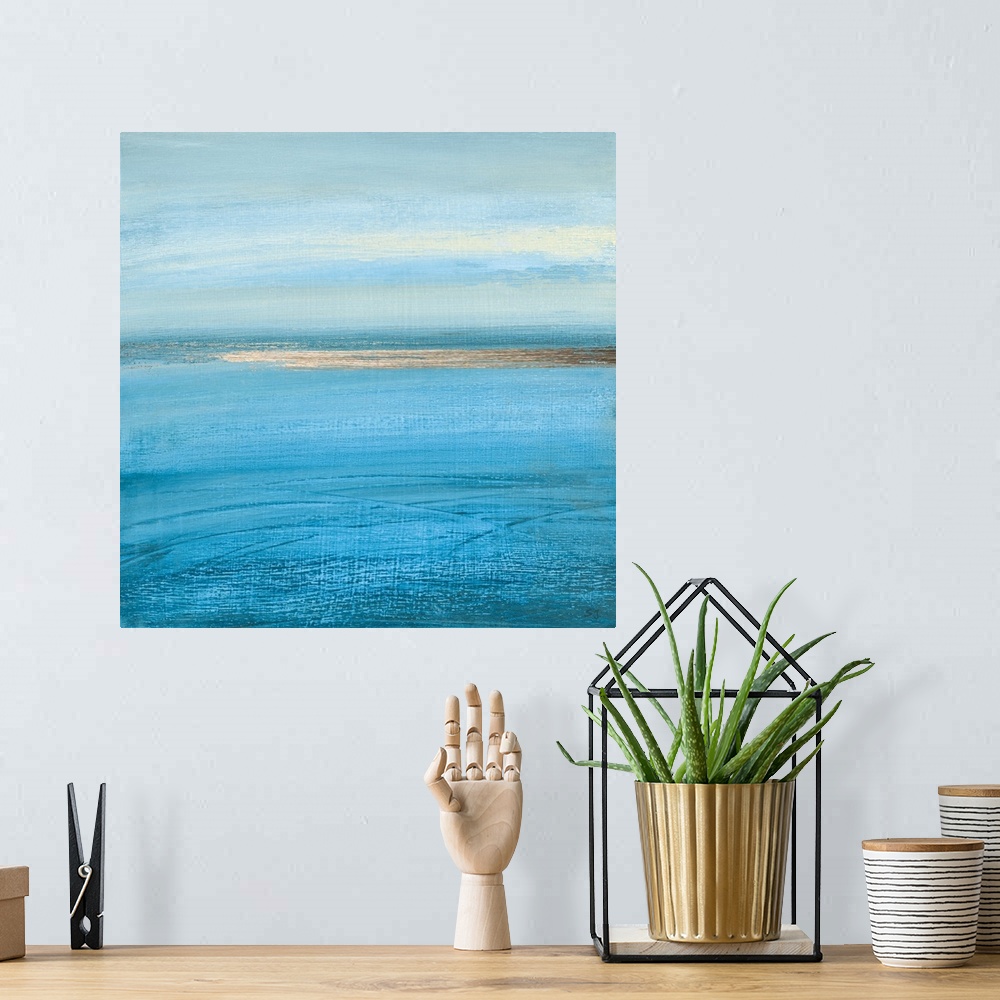 A bohemian room featuring Square abstract painting of a seascape.