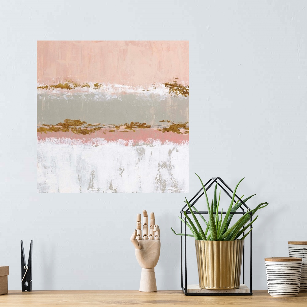 A bohemian room featuring Square abstract artwork made with horizontal sections in pale pink, gray, white, and metallic gol...