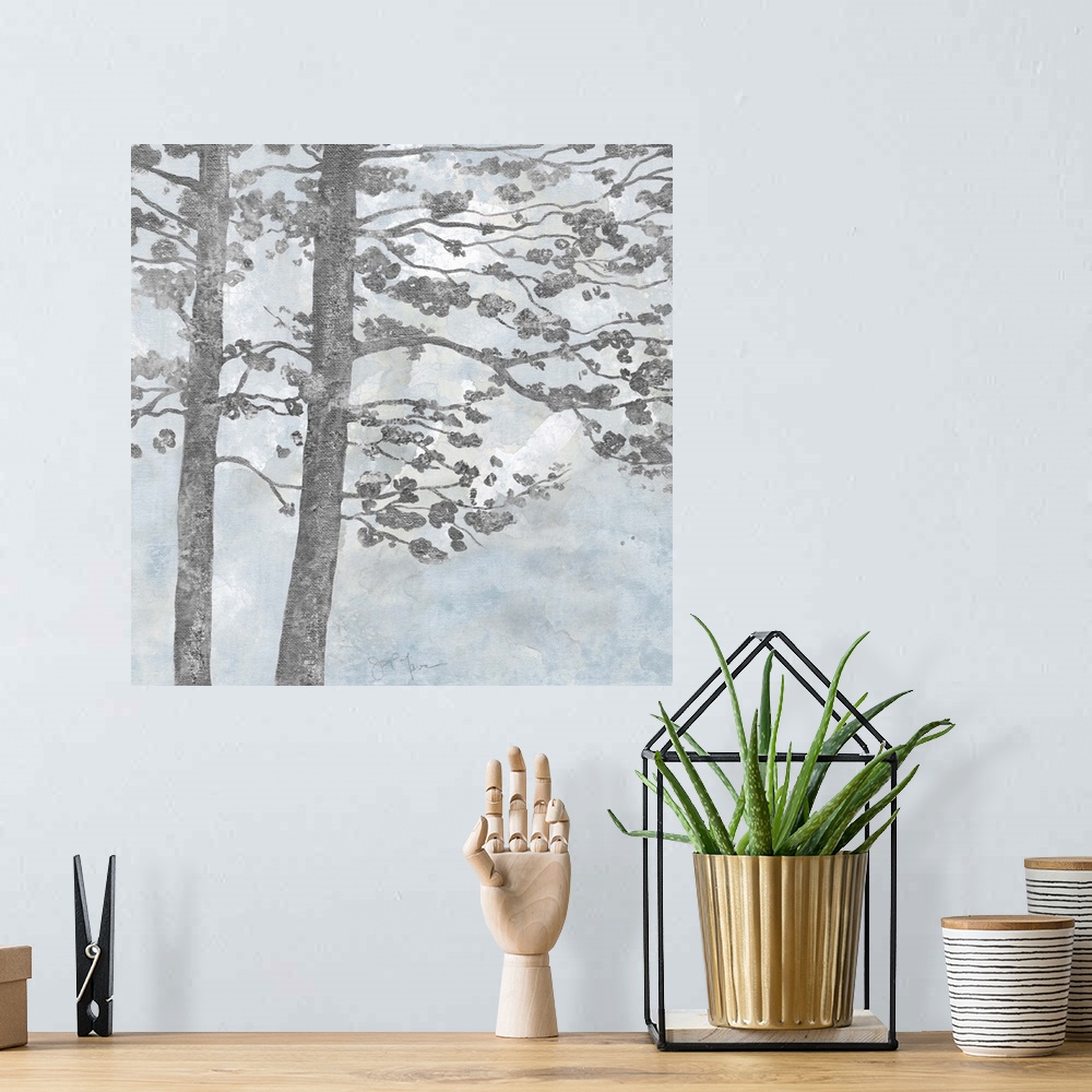 A bohemian room featuring Contemporary square painting of silver silhouettes of trees with a light blue and white background.