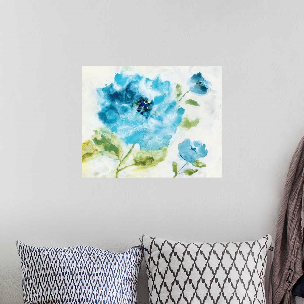 A bohemian room featuring Abstract painting of blue flowers on a white background.