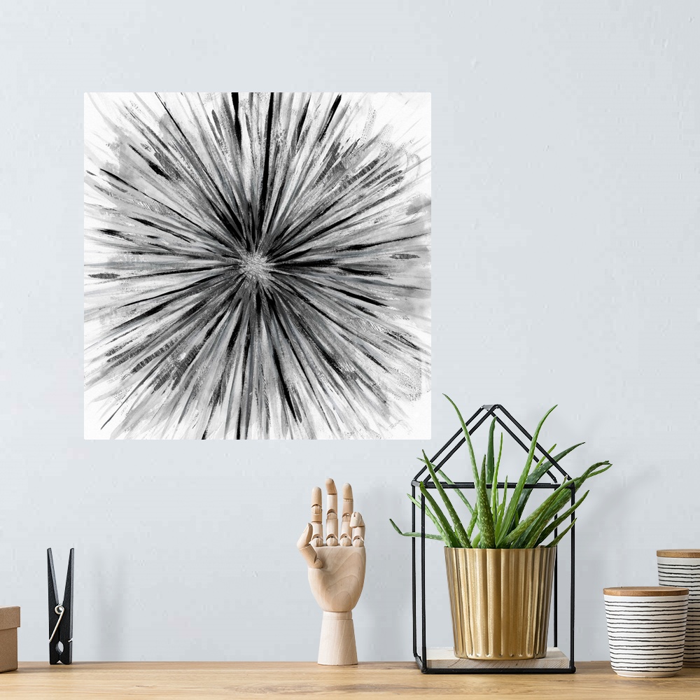 A bohemian room featuring Square abstract artwork of a black and grey sunburst design on a white background.