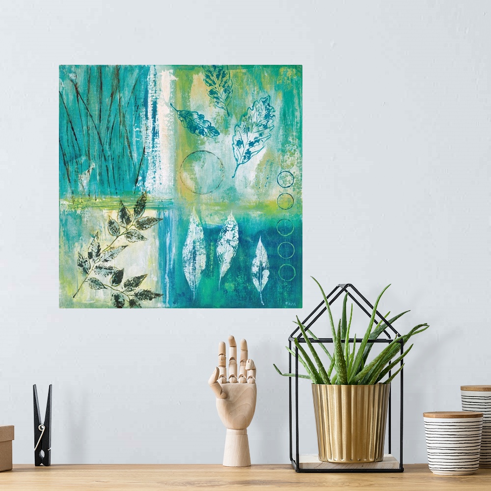 A bohemian room featuring Square painting divided into four sections with different leaf prints in each, made with teal, gr...